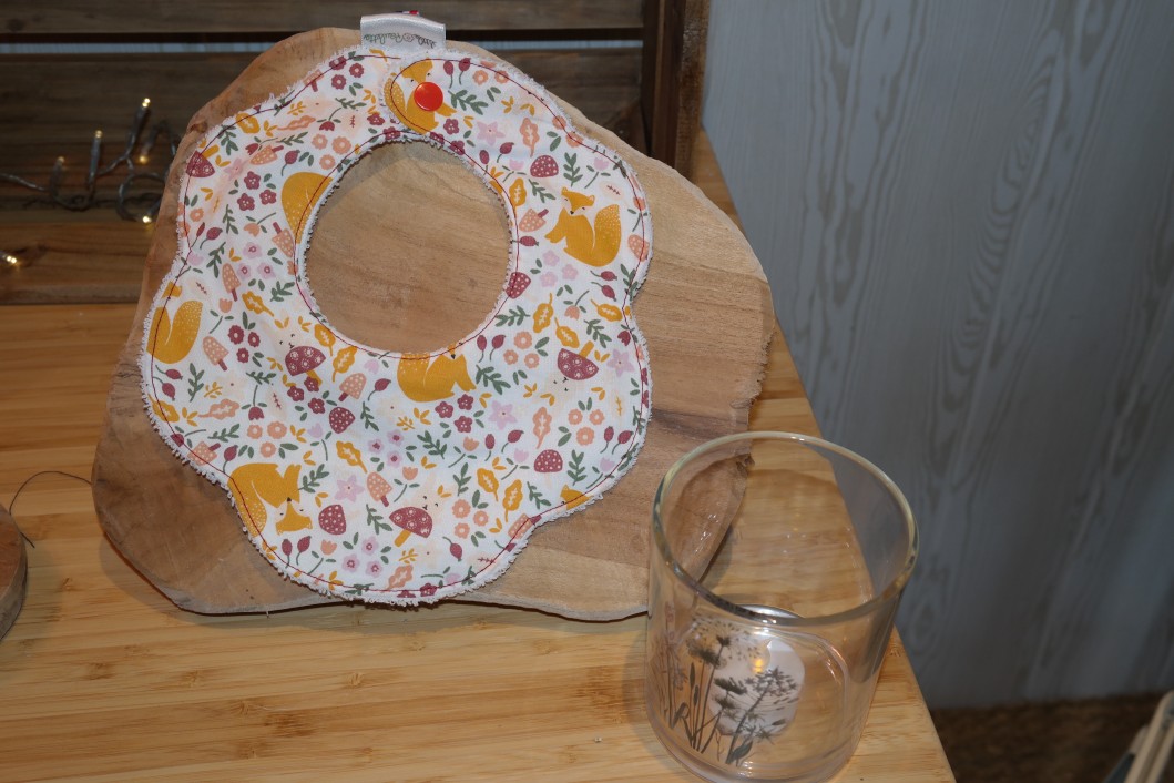 Bavoir fleur Renards fleuris